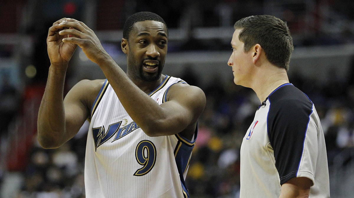 Wizards point guard Gilbert Arenas (9) talks to an official against the Los Angeles Lakers at Verizon Center