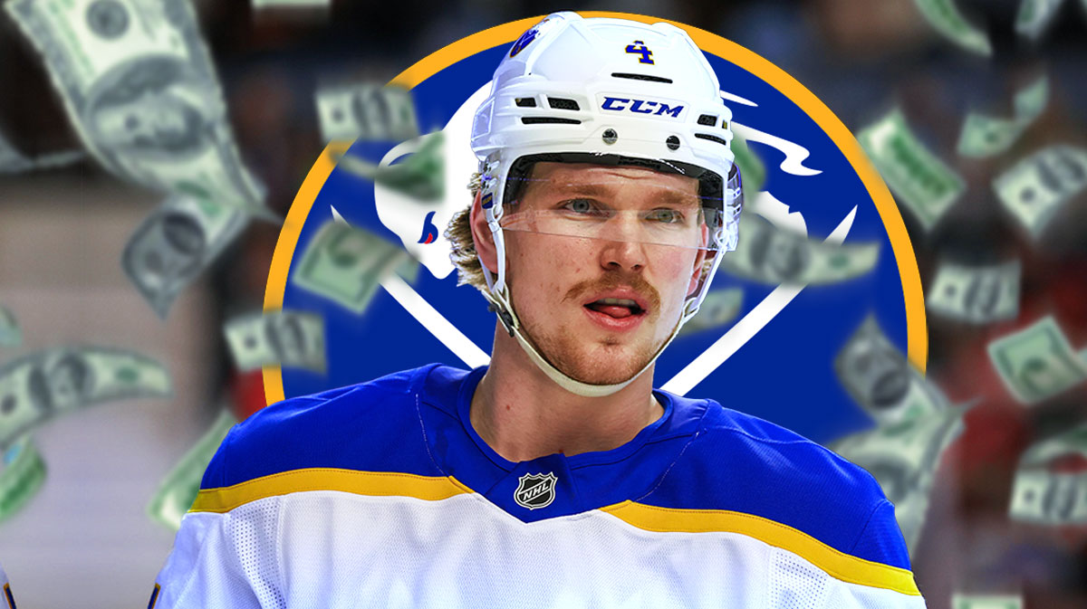 Bowen Byram with money around him and a Sabres logo in the background. NHL