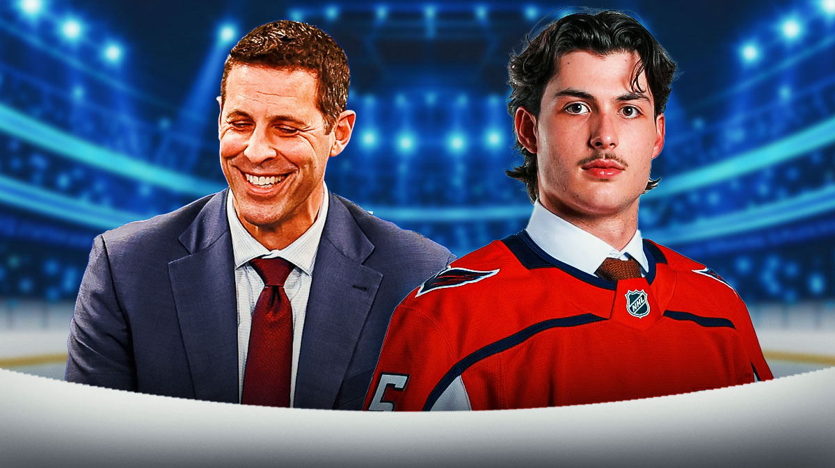 Lynden Lakovic and Chris Patrick (Capitals GM) with the caps logo in the background. Capitals draft grade