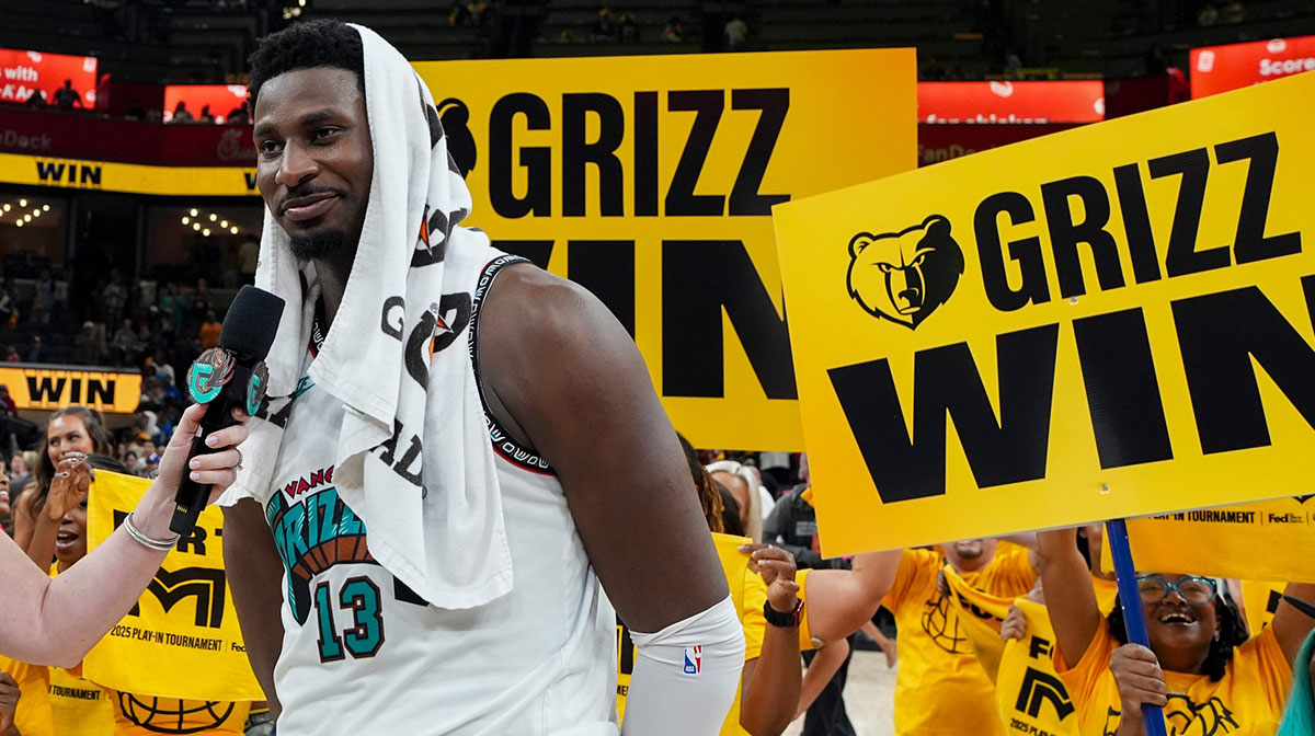 Grizzlies' Jaren Jackson Jr. (13) smiles as he’s interviewed in front of a Grizzlies hype crew