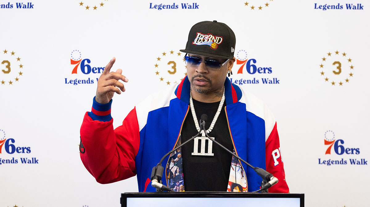 76ers great Allen Iverson speaks at the podium during the unveiling of a statue honoring him in a ceremony at Penn Medicine Philadelphia 76ers Training Complex
