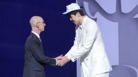 Yang Hansen greets NBA commissioner Adam Silver after being selected as the 16th pick by the Memphis Grizzlies in the first round of the 2025 NBA Draft at Barclays Center.