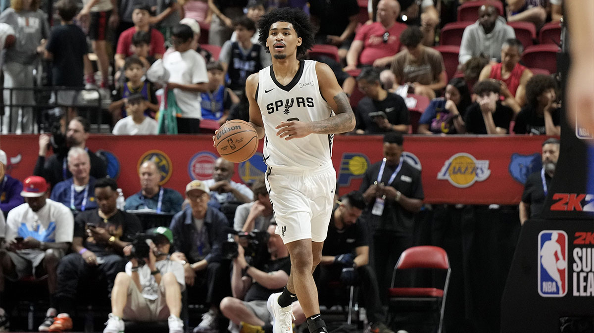 San Antonio Spurs guard Dylan Harper (2) dribbles the ball against the Dallas Mavericks in the second quarter of their game at Thomas & Mack Center.