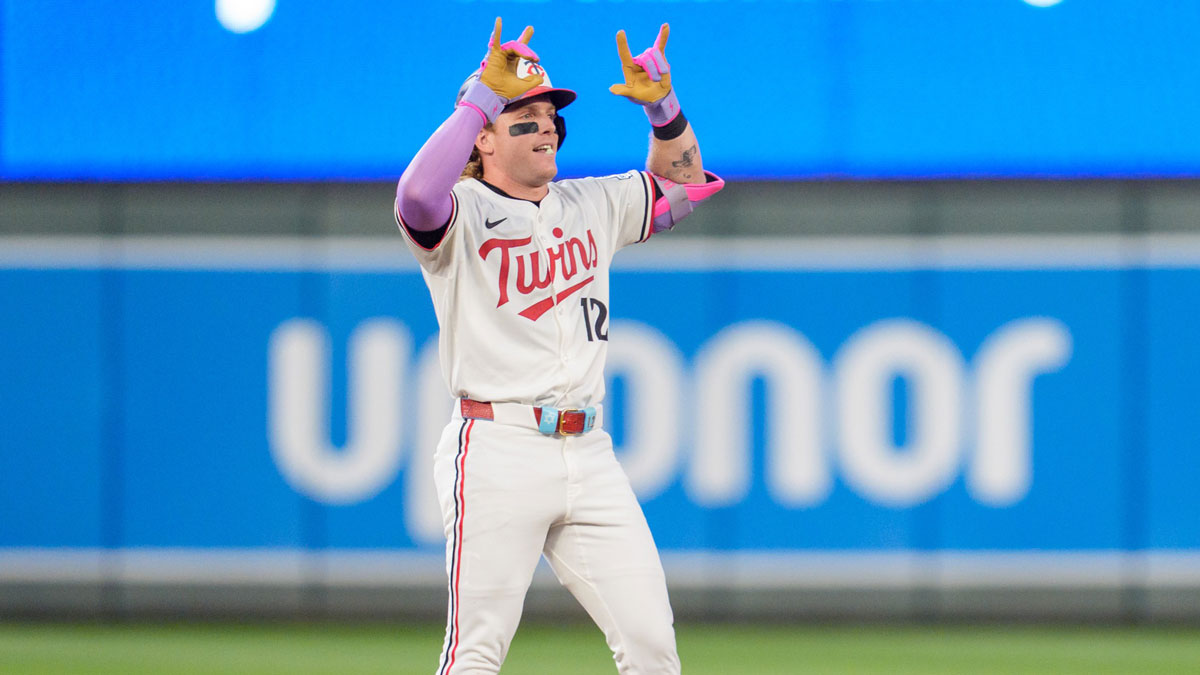 Minnesota Twins left fielder Harrison Bader (12) hits a ground rule double in the eighth inning off Washington Nationals pitcher Jackson Rutledge (79) at Target Field.