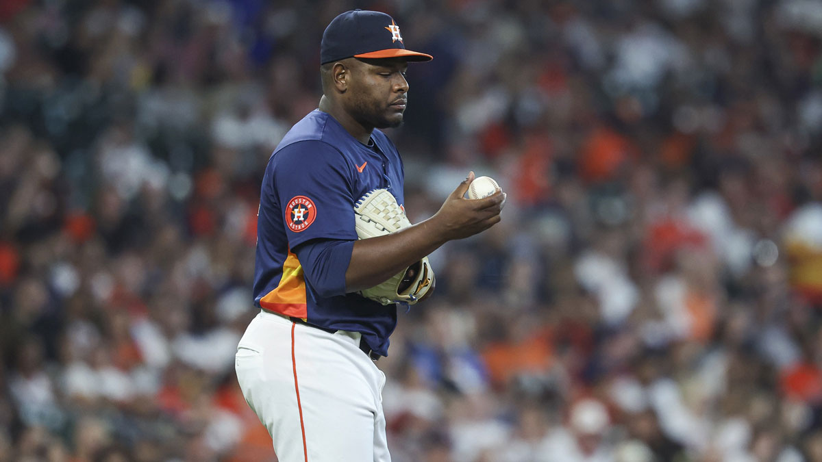 Houston Astros relief pitcher Hector Neris (50) reacts after a run scores on a balk call during the seventh inning against the Los Angeles Angels at Minute Maid Park.