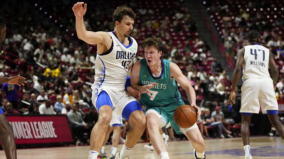 Charlotte Hornets guard Kon Knueppel (7) drives the ball against Dallas Mavericks forward Matt Cross (43) during the second half of a NBA basketball game at the Thomas & Mack Center.