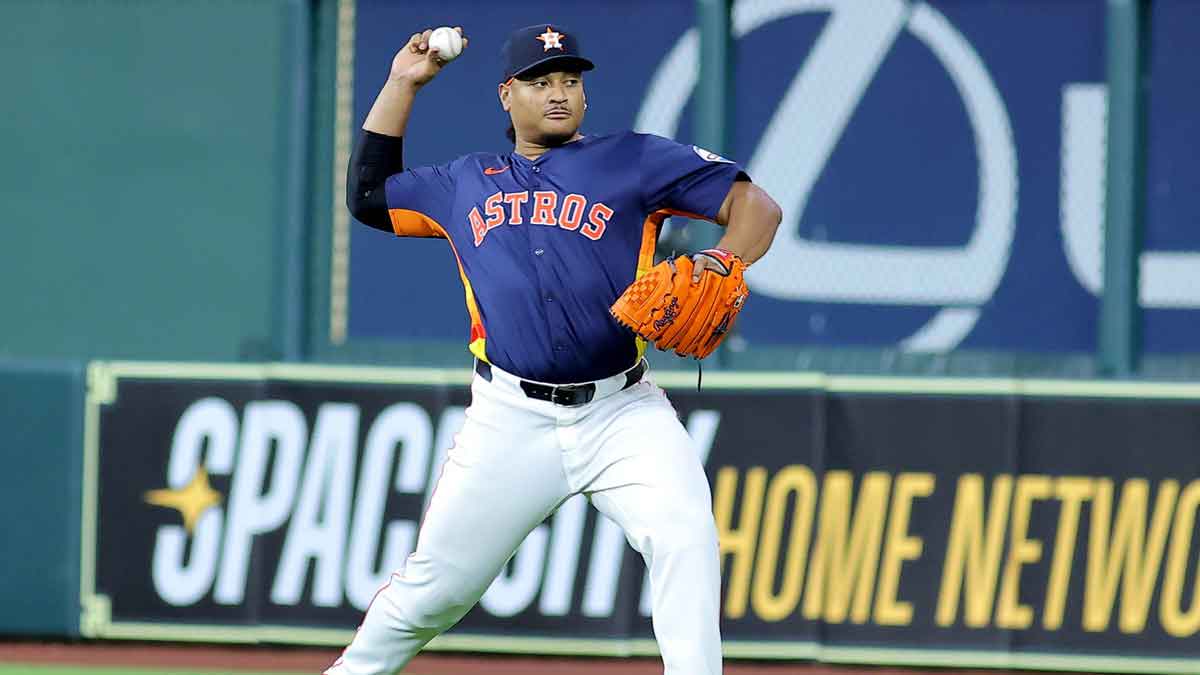 Houston Astros pitcher Luis Garcia (77) works out prior to the game against the Athletics.