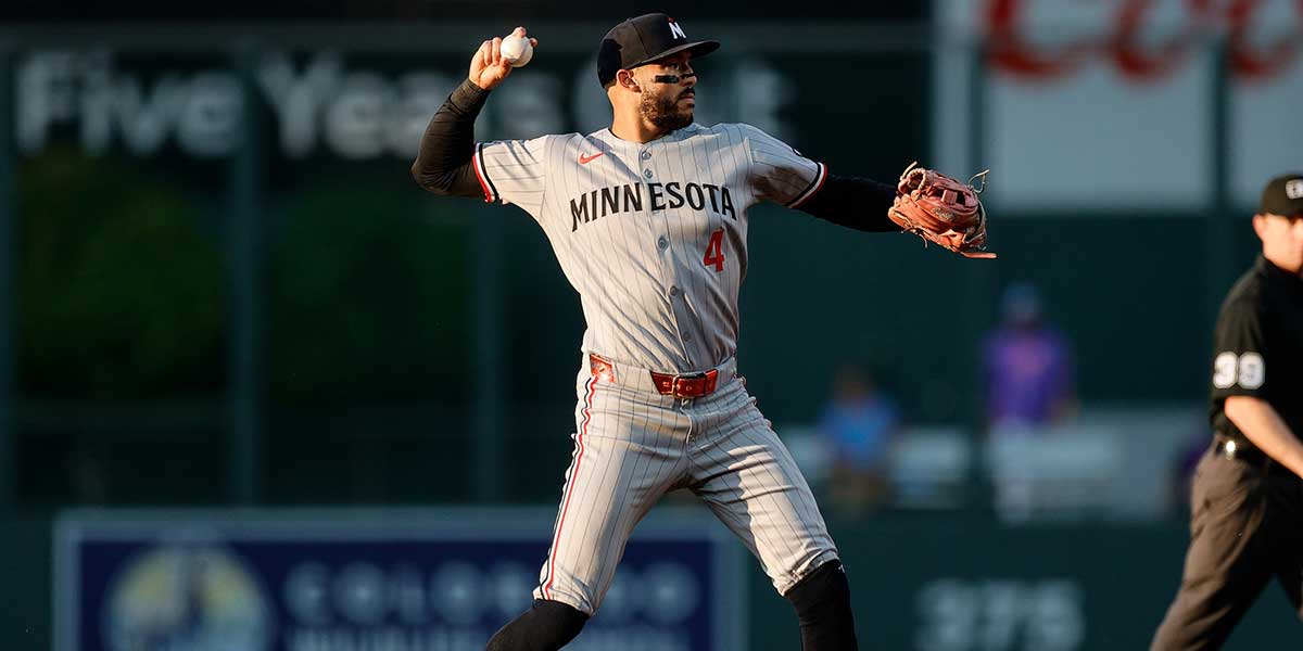 Minnesota Twins shortstop Carlos Correa (4) field the ball in the fourth inning against the Colorado Rockies at Coors Field.