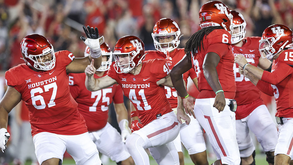 Houston Cougars place kicker Jack Martin (41) reacts after kicking a field goal with time expiring in the fourth quarter to give the Cougars a win over Utah Utes at TDECU Stadium.