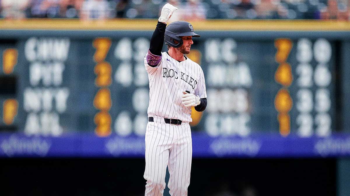 Colorado Rockies third baseman Ryan McMahon (24) reacts from second on a double in the seventh inning against the Minnesota Twins at Coors Field.