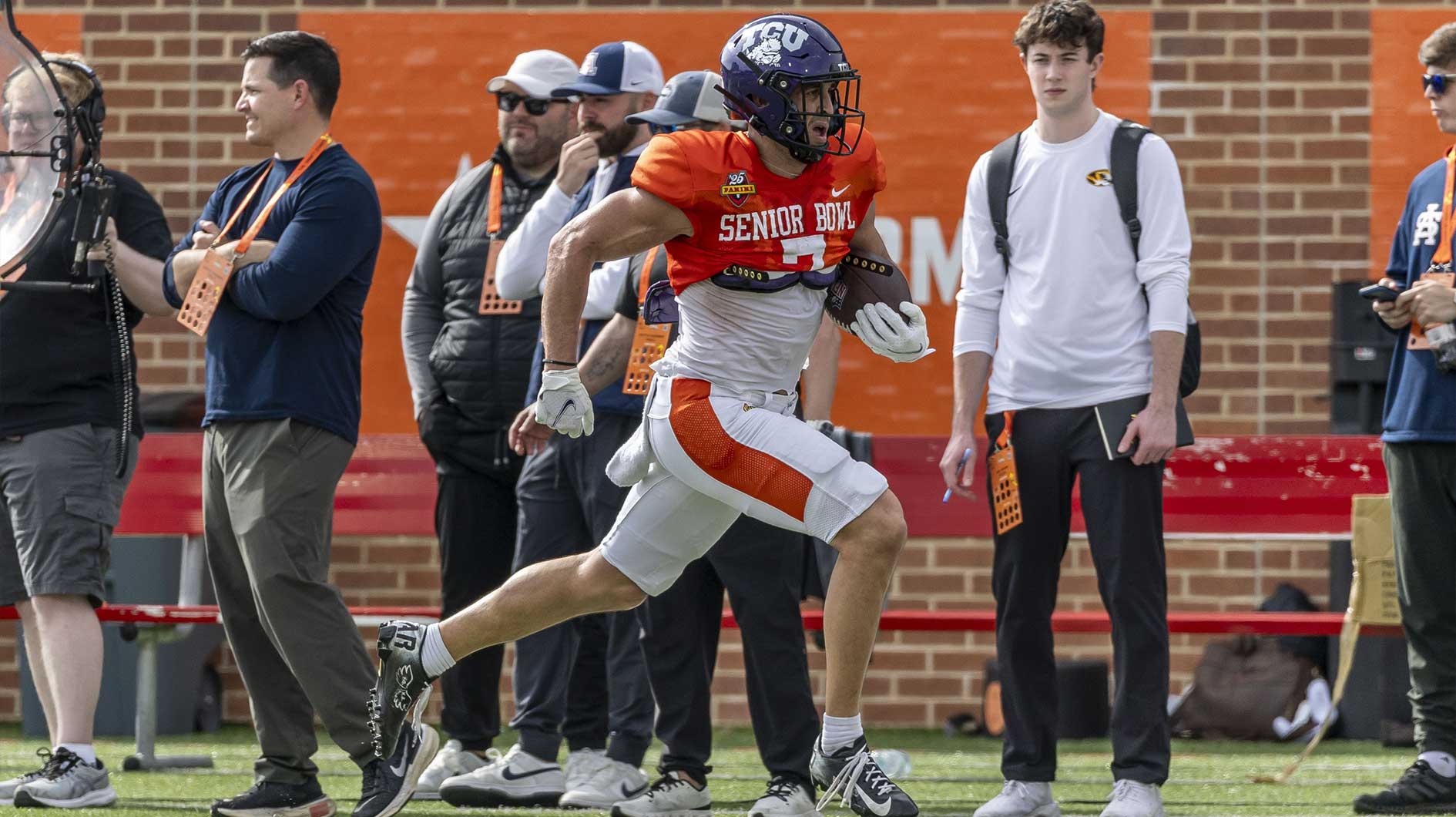 American team wide receiver Jack Bech of TCU (7) runs after a catch during Senior Bowl practice for the American team at Hancock Whitney Stadium.