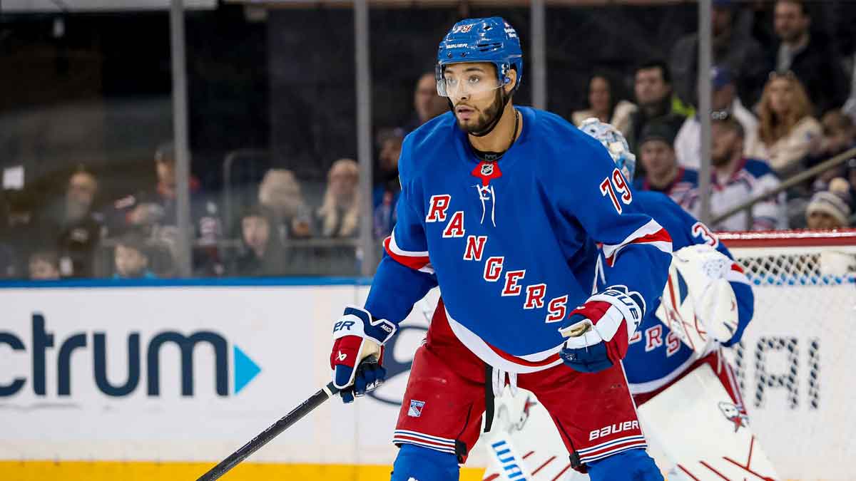New York Rangers defenseman K'Andre Miller (79) defends against the Vancouver Canucks during the second period at Madison Square Garden.