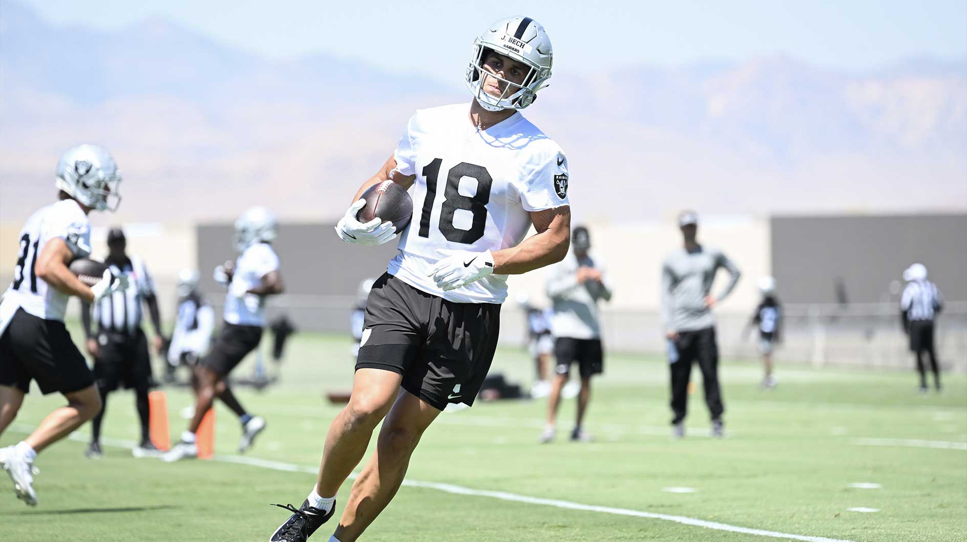 Las Vegas Raiders wide receiver Jack Bech (18) runs a drill during Las Vegas Raiders Minicamp at Intermountain Health Performance Center.