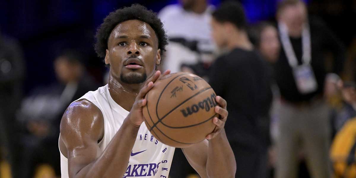 Los Angeles Lakers guard Bronny James (9) warms up prior to the game against the Minnesota Timberwolves at Crypto.com Arena. Los Angeles Lakers guard Bronny James (9) warms up prior to the game against the Minnesota Timberwolves at Crypto.com Arena.