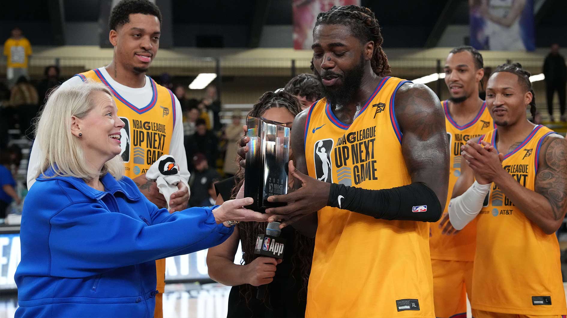 Team Braxton guard Kevon Harris (12) of the College Park Skyhawks receives the Most Valuable Player Trophy after defeating Team Swish Cultures at Moscone Center.