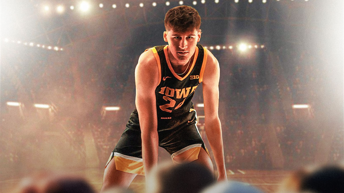 High school basketball player Trey Thompson in an Iowa Hawkeyes basketball jersey, recruit reclassify