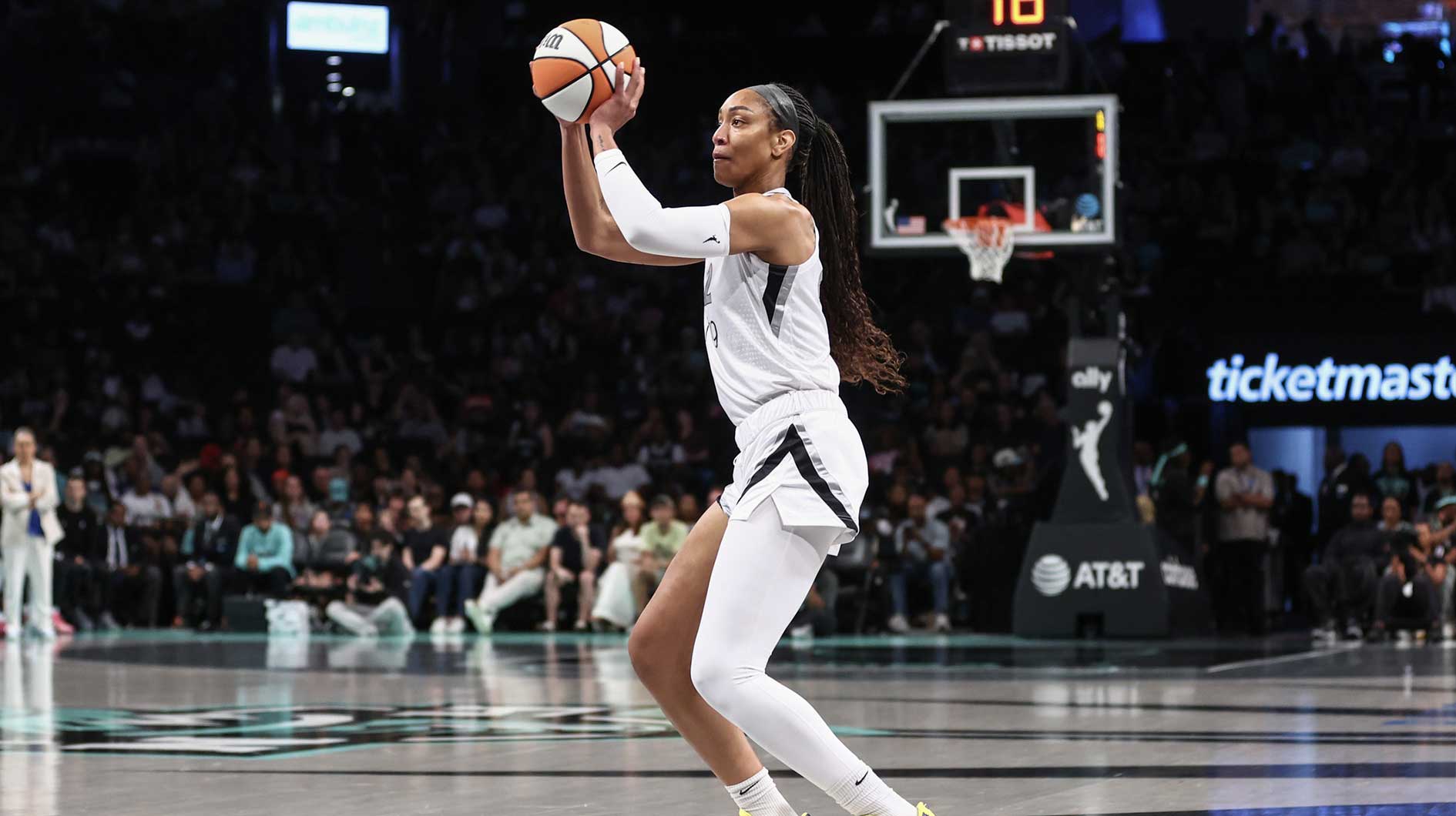 Las Vegas Aces center A'ja Wilson (22) takes a three point shot in the first quarter against the New York Liberty at Barclays Center.
