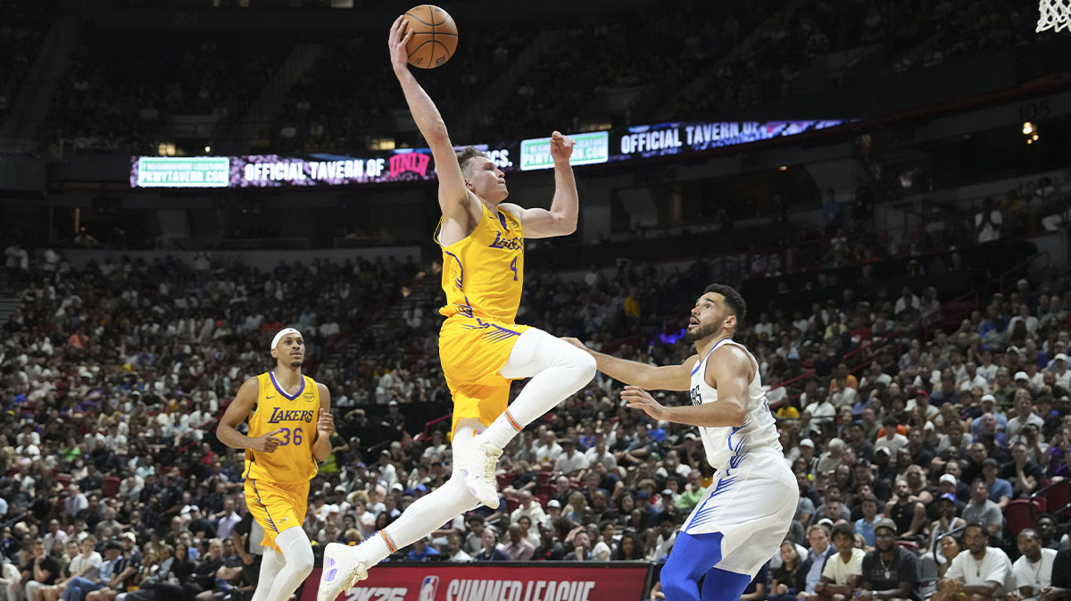 Los Angeles Lakers guard Dalton Knecht (4) jumps towards the basket against the Dallas Mavericks in the fourth quarter of their game at Thomas & Mack Center.
