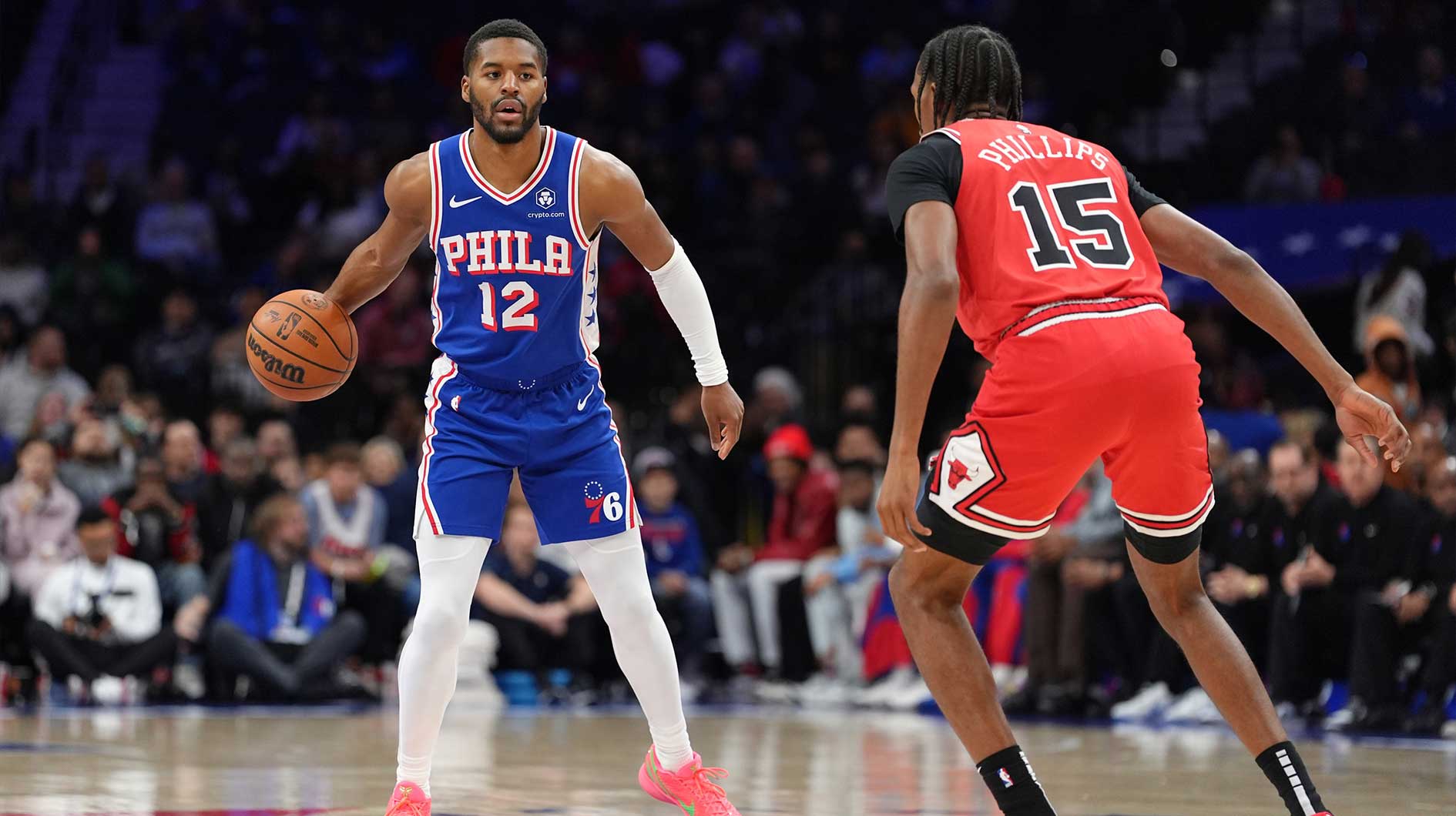 Philadelphia 76ers guard Jared Butler (12) controls the ball against the Chicago Bulls in the first quarter at Wells Fargo Center.