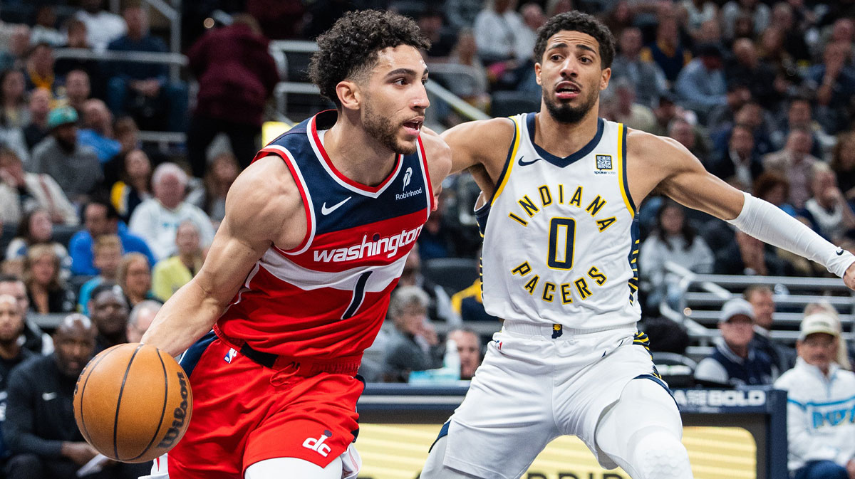 Washington Wizards guard Colby Jones (1) dribbles the ball while Indiana Pacers guard Tyrese Haliburton (0) defends in the second half at Gainbridge Fieldhouse.