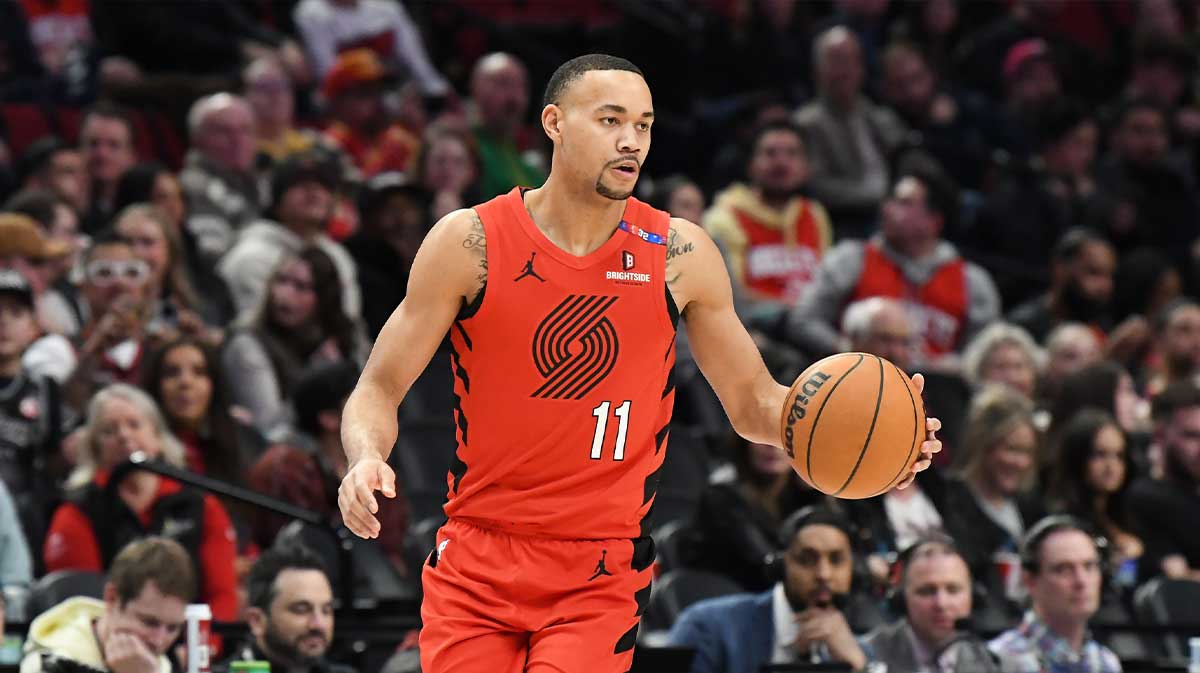Portland Trail Blazers guard Bryce McGowens (11) brings the ball forward during the second half at Moda Center.