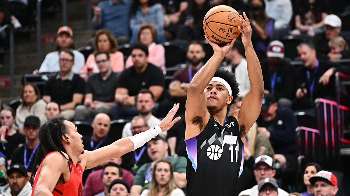 Utah Jazz guard Jaden Springer (11) shoots over Portland Trail Blazers guard Dalano Banton (5) in the first half at Delta Center.