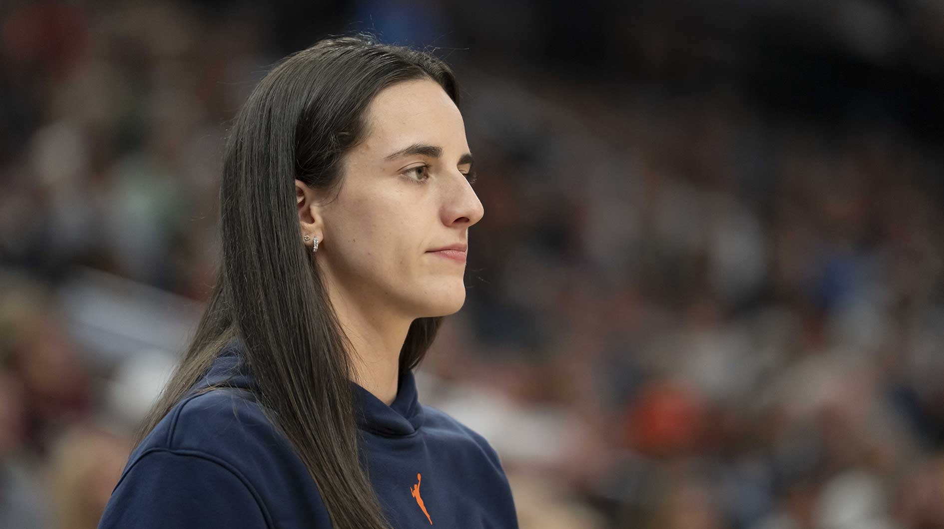 Indiana Fever guard Caitlin Clark (22) looks on against the Minnesota Lynx in the second half during the Commissioner's Cup final at Target Center.
