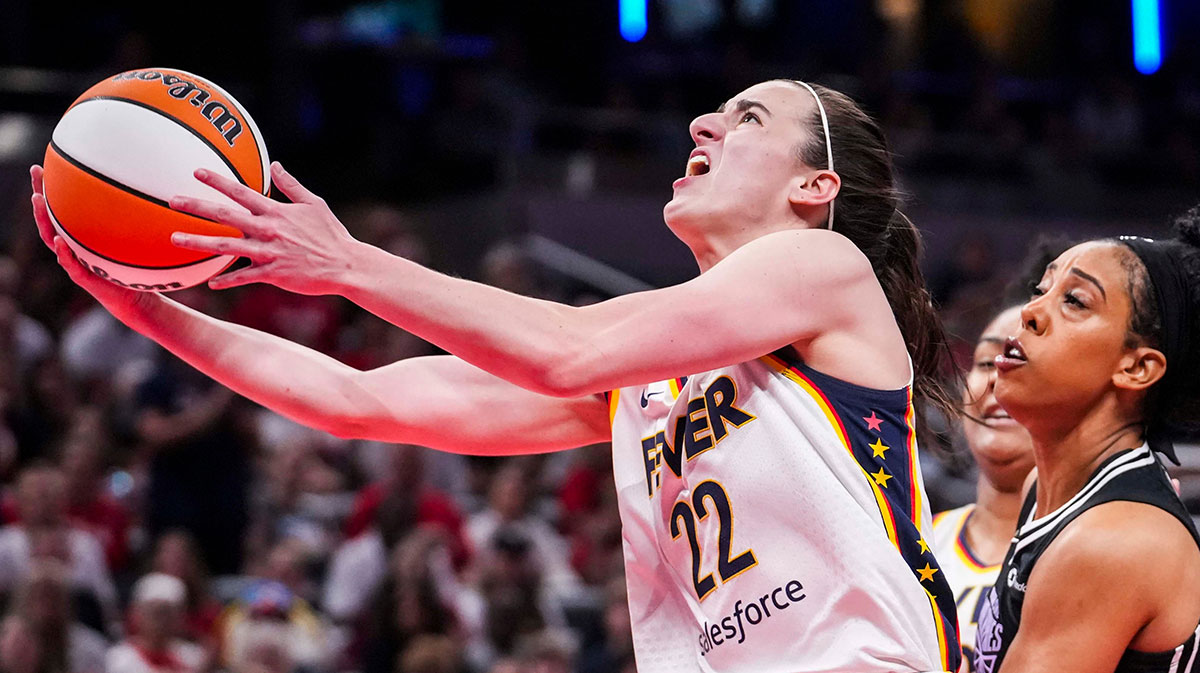 Indiana Fever guard Caitlin Clark (22) goes up for a basket Monday, Jan. 6, 2025, during a game between the Indiana Fever and the Golden State Valkyries at Gainbridge Fieldhouse in Indianapolis. The Golden State Valkyries defeated the Indiana Fever, 80-61. Mitchell