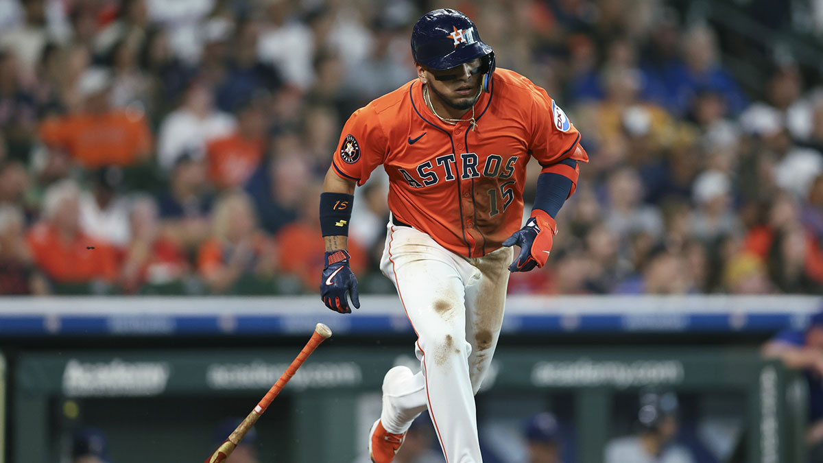 Houston Astros third baseman Isaac Paredes (15) laughs with teammates before playing against the Texas Rangers at Daikin Park.