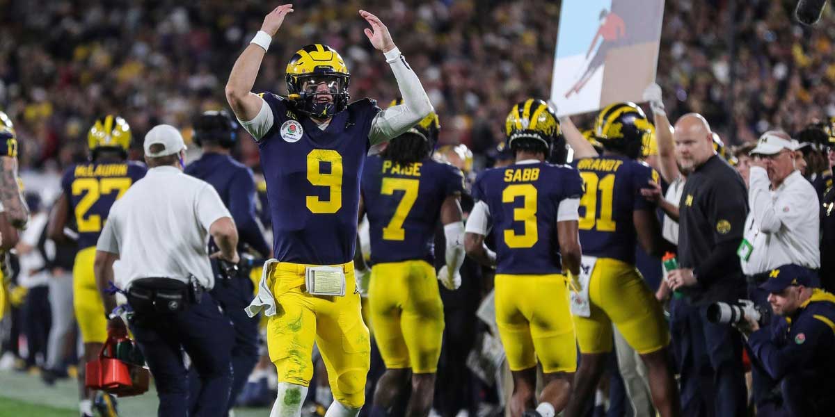 Michigan quarterback J.J. McCarthy celebrates a play against Alabama during overtime of the Rose Bowl