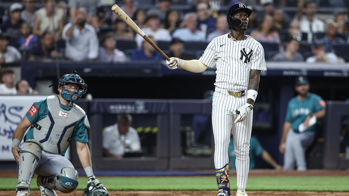 New York Yankees second baseman Jazz Chisholm Jr. (13) hits a two run home run in the fifth inning against the Seattle Mariners at Yankee Stadium.