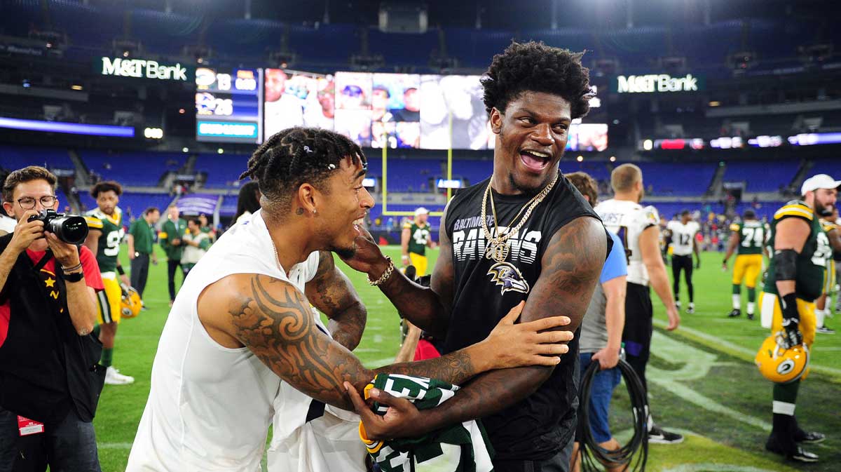 Aug 15, 2019; Baltimore, MD, USA; Baltimore Ravens quarterback Lamar Jackson (right) talks to Green Bay Packers cornerback Jaire Alexander (left) after the game at M&T Bank Stadium. 