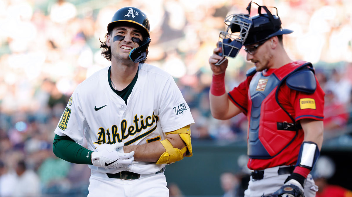 Athletics shortstop Jacob Wilson (5) reacts after getting hit by a pitch by Atlanta Braves starting pitcher Didier Fuentes (75) during the first inning at Sutter Health Park.