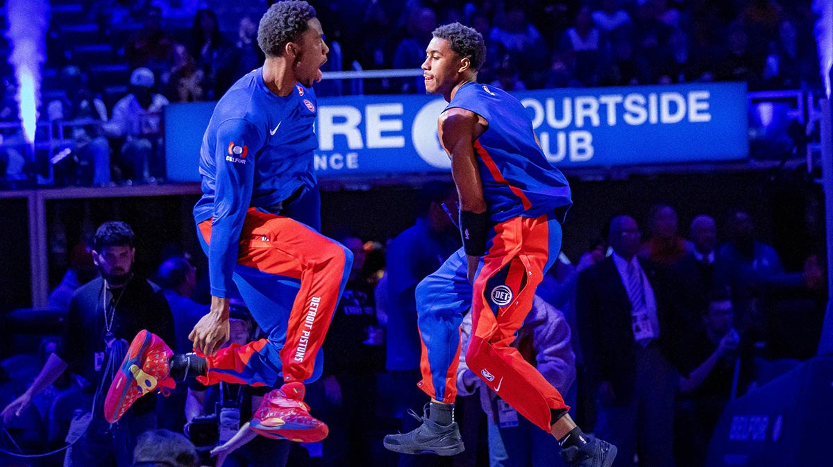 Detroit Pistons center Jalen Duren (0) and guard Jaden Ivey (23) jump in the air before the start of the first quarter at Little Caesars Arena.