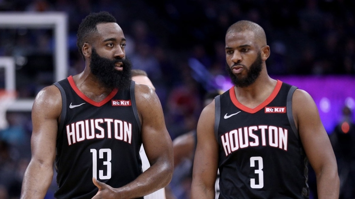 Houston Rockets guard James Harden (13) talks with guard Chris Paul (3) during a timeout in the third quarter against the Sacramento Kings at Golden 1 Center.