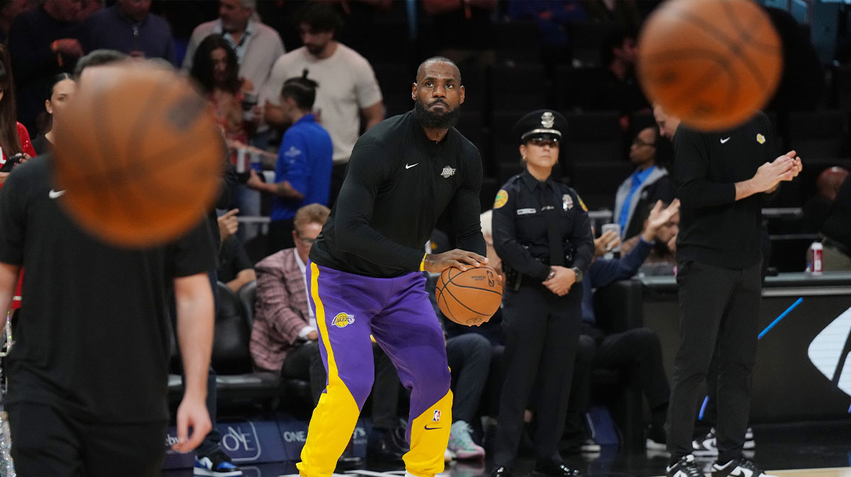 Los Angeles Lakers forward LeBron James (23) warms-up before a game against the Miami Heat at Kaseya Center.