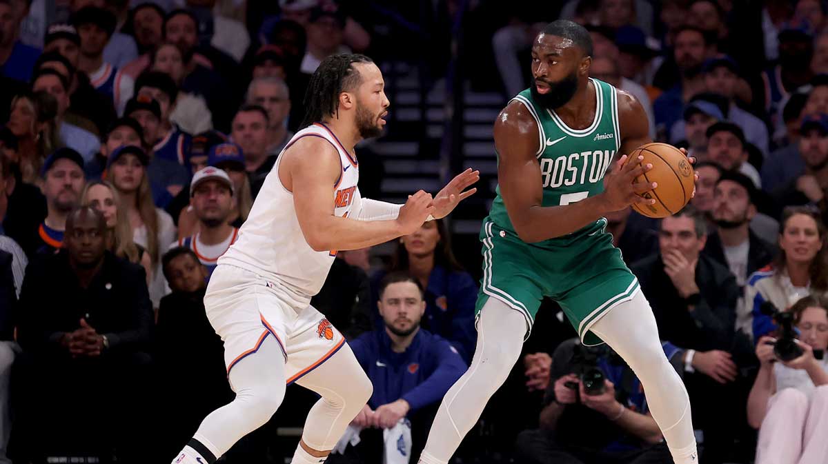 Boston Celtics guard Jaylen Brown (7) controls the ball against New York Knicks guard Jalen Brunson (11) during the first quarter of game six in the second round of the 2025 NBA Playoffs at Madison Square Garden.