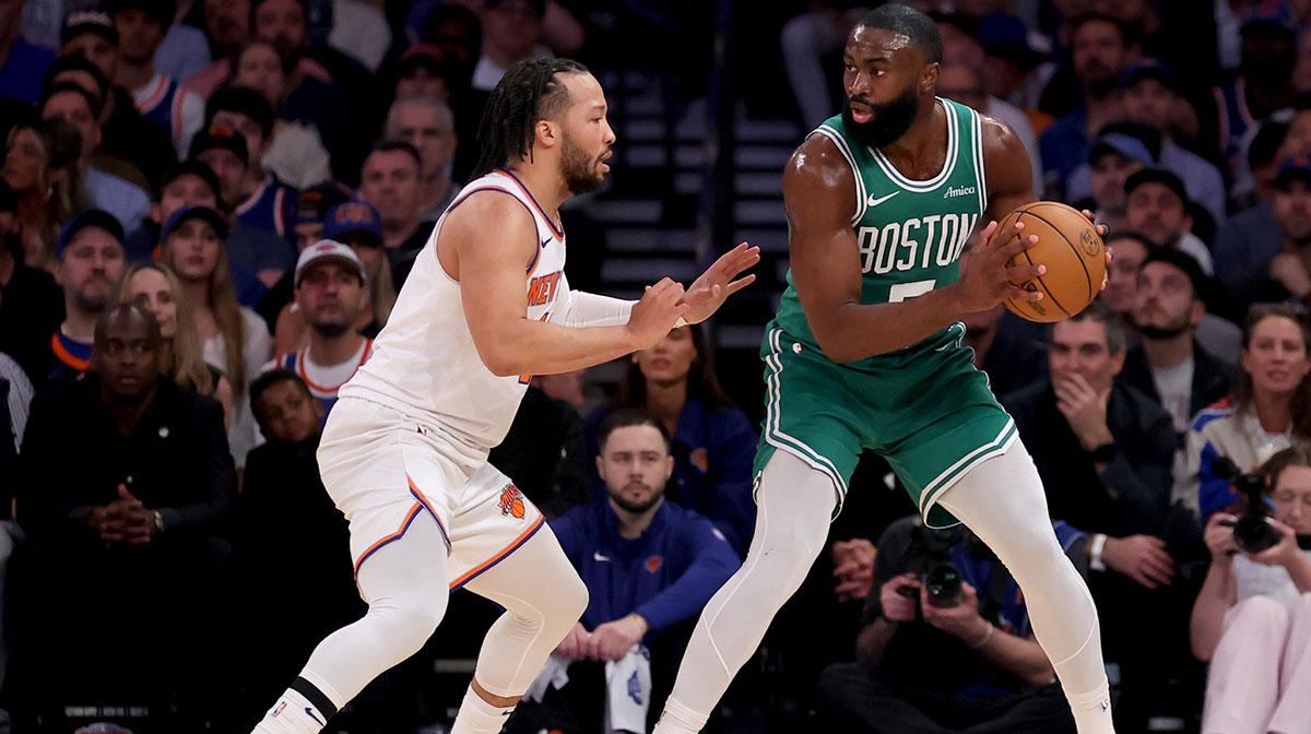 Boston Celtics guard Jaylen Brown (7) controls the ball against New York Knicks guard Jalen Brunson (11) during the first quarter of game six in the second round of the 2025 NBA Playoffs at Madison Square Garden.