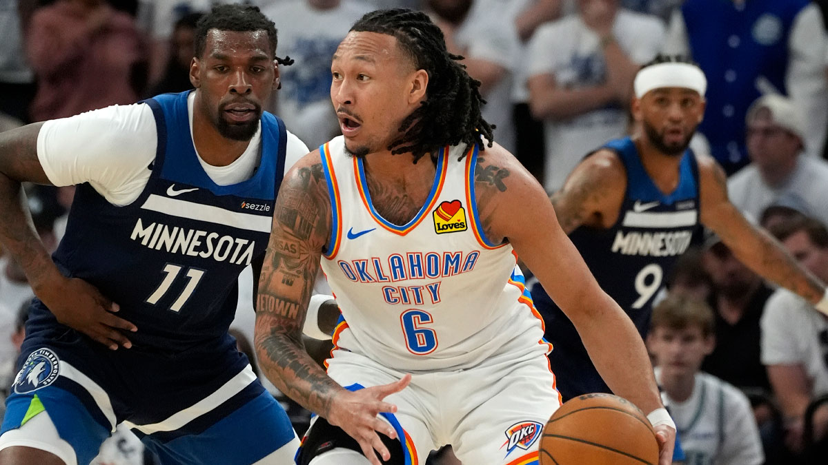Oklahoma City Thunder forward Jaylin Williams (6) dribbles the ball against Minnesota Timberwolves center Naz Reid (11) during the second half in game three of the western conference finals for the 2025 NBA Playoffs at Target Center.