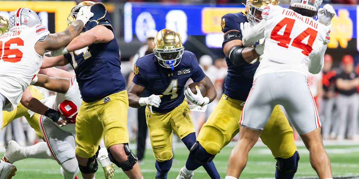 Notre Dame Fighting Irish running back Jeremiyah Love (4) against the Ohio State Buckeyes during the CFP National Championship college football game at Mercedes-Benz Stadium.
