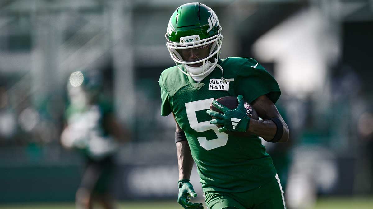 New York Jets wide receiver Garrett Wilson (5) participates in a drill during training camp at Atlantic Health Jets Training Center.