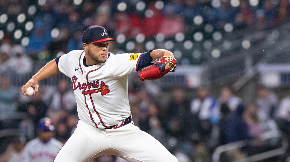 Apr 9, 2024; Cumberland, Georgia, USA; Atlanta Braves pitcher Joe Jimenez (77) pitches the ball against Atlanta Braves during the eighth inning at Truist Park. Mandatory Credit: Jordan Godfree-Imagn Images