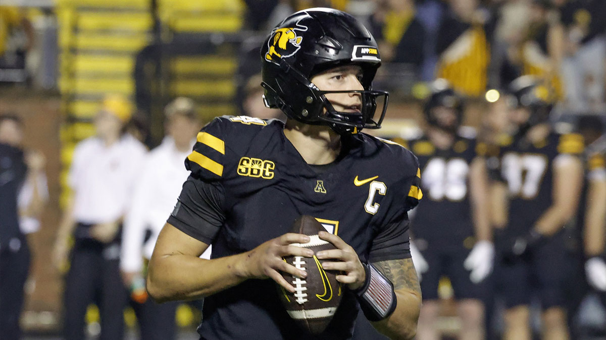 Appalachian State Mountaineers quarterback Joey Aguilar (4) drops to throw a pass during the second half against the South Alabama Jaguars at Kidd Brewer Stadium.
