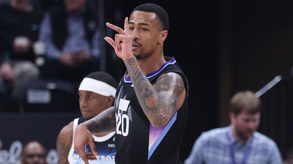 Utah Jazz forward John Collins (20) reacts to a three point basket against the Minnesota Timberwolves during the second half at Delta Center.