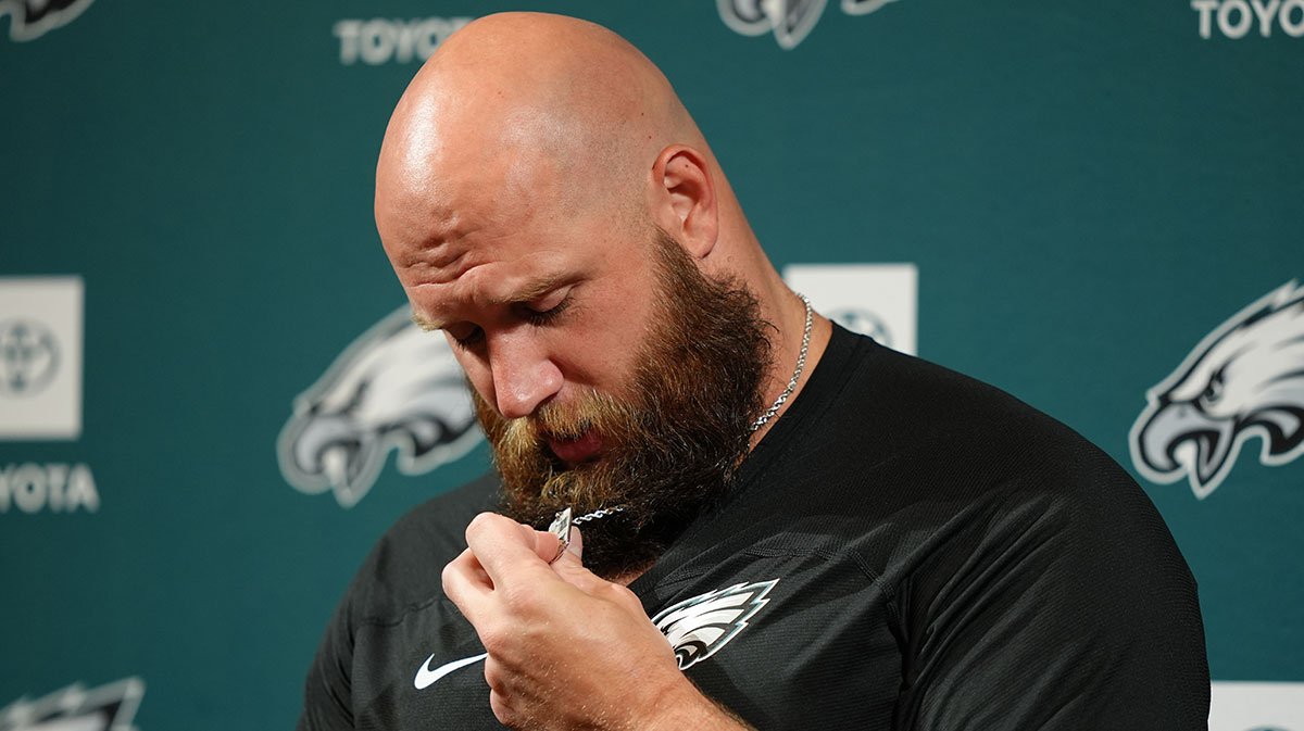 Philadelphia Eagles offensive lineman Lane Johnson (65) displays a necklace containing Super Bowl logos during a press conference at NovaCare Complex.