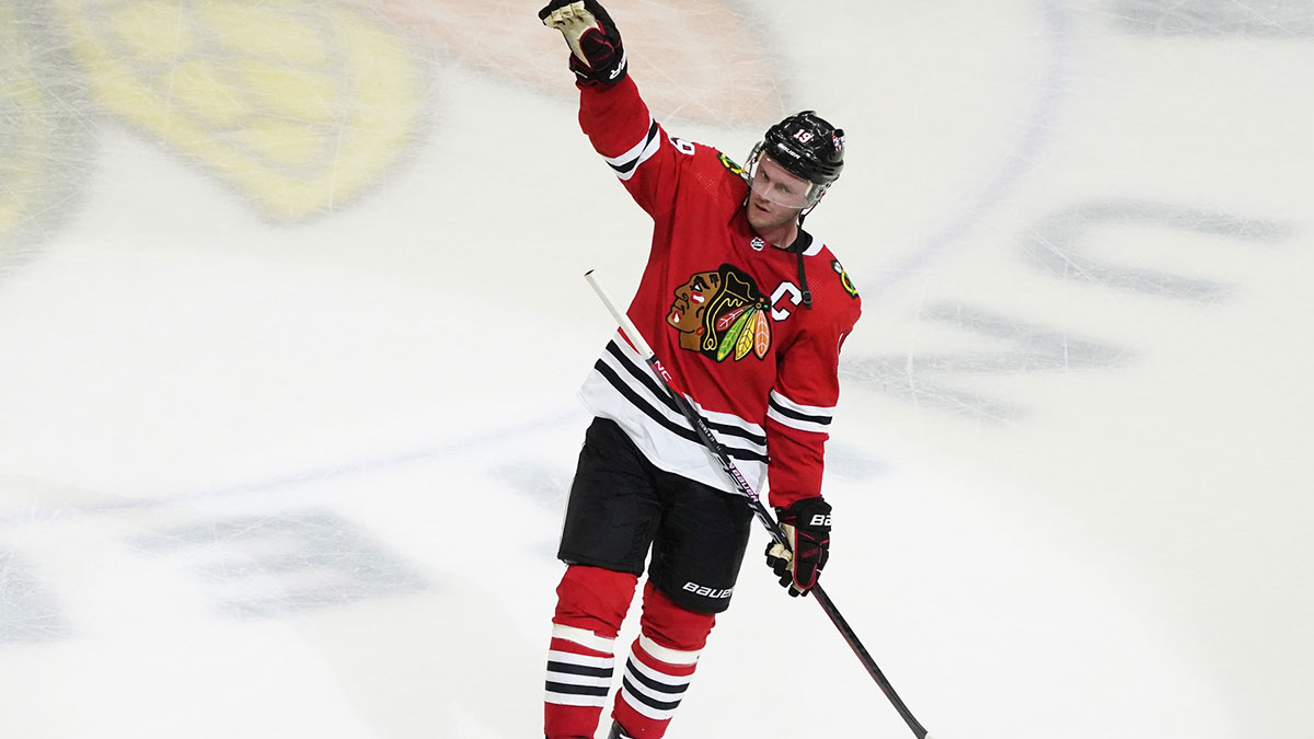 Chicago Blackhawks center Jonathan Toews (19) is honored after the game against the Philadelphia Flyers. He played his last game as a Blackhawk, at United Center.