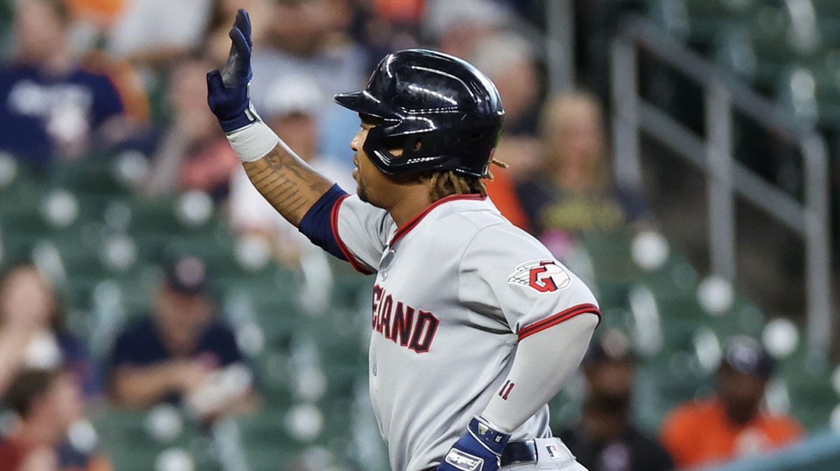 Cleveland Guardians third baseman Jose Ramirez (11) reacts after hitting a home run against the Houston Astros in the first inning at Daikin Park.