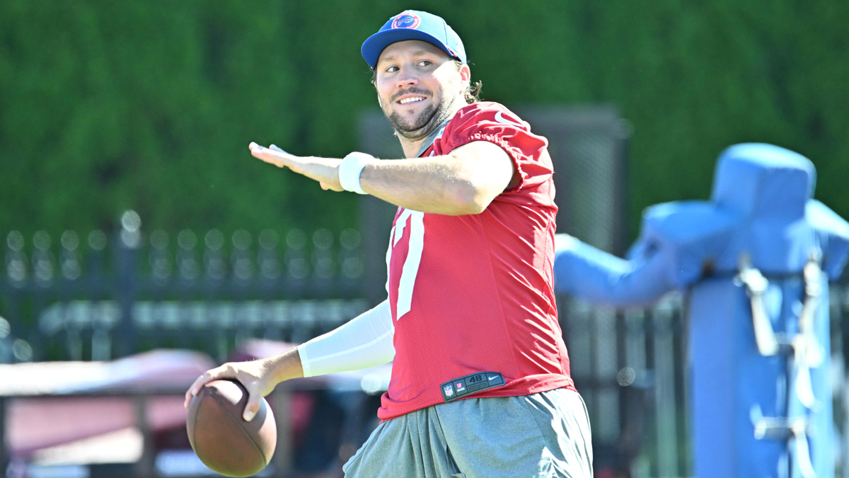Buffalo Bills quarterback Josh Allen (17) warms up during training camp at St. John Fisher University.