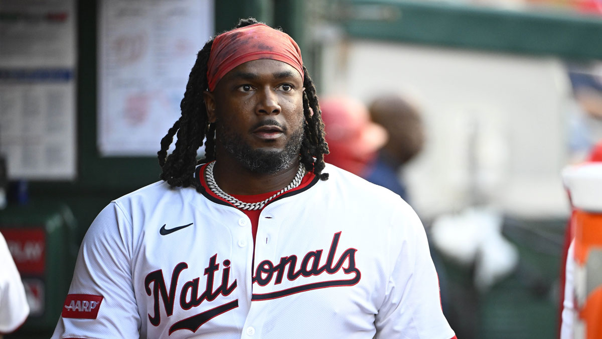 Washington Nationals designated hitter Josh Bell (19) in the dugout after hitting a solo home run against the Cincinnati Reds during the fourth inning at Nationals Park.