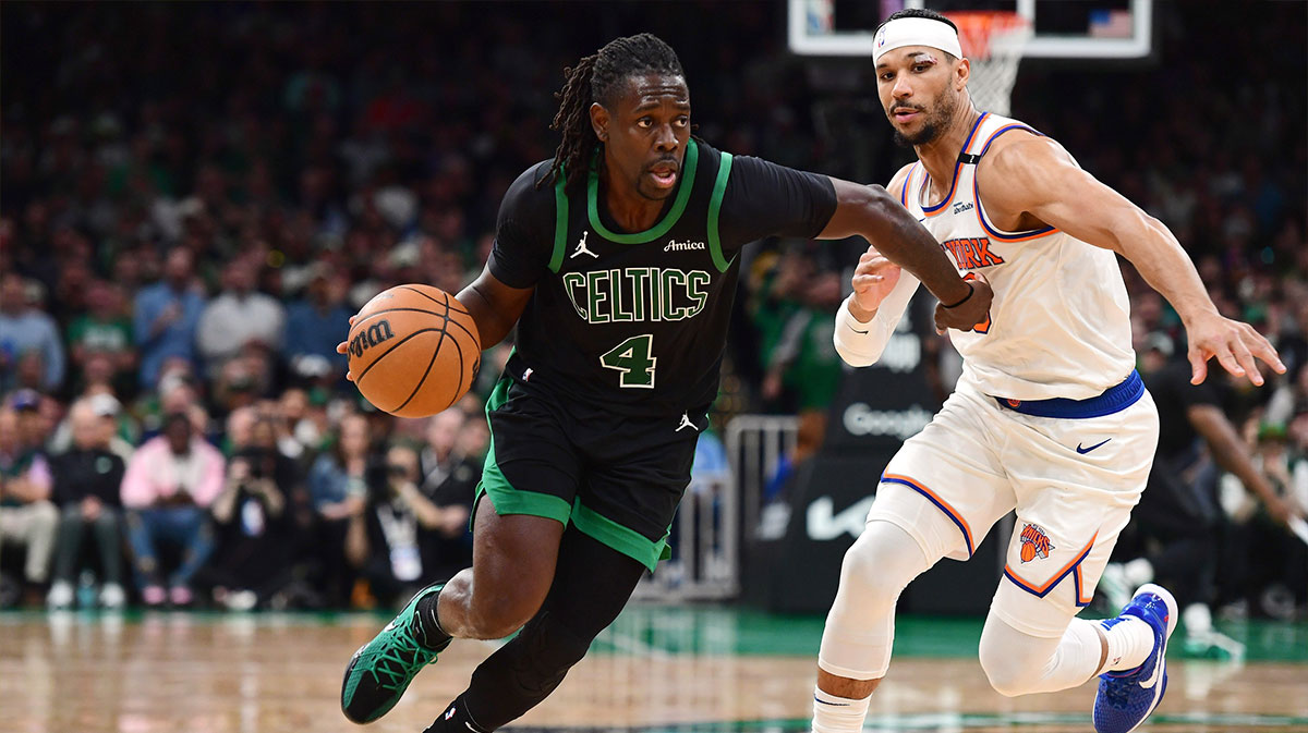 Boston Celtics guard Jrue Holiday (4) controls the ball while New York Knicks guard Josh Hart (3) defends in the second half during game five of the second round for the 2025 NBA Playoffs at TD Garden.